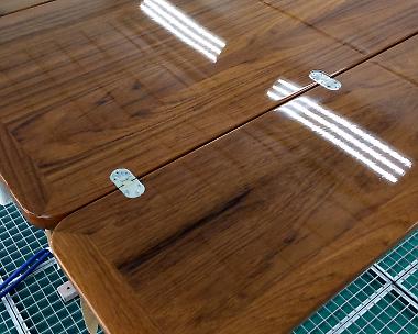 Hight solid clear varnish on teck table of Yacht